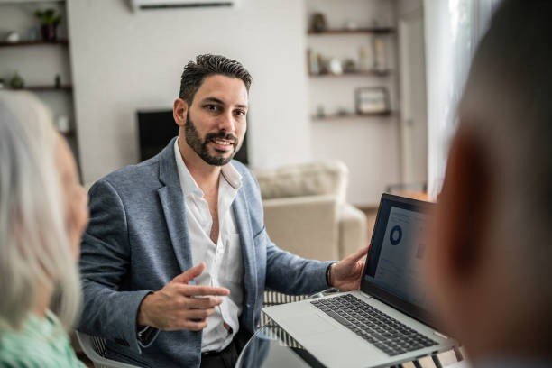 Agent explaining Self Employed Mortgage Options to clients