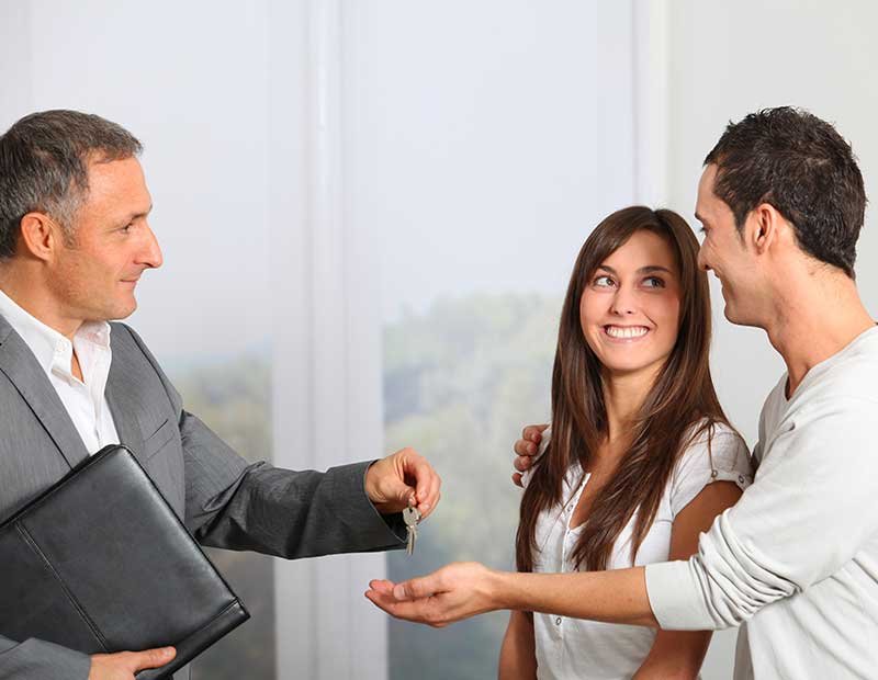 Client taking key of their second home